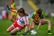 8 June 2019; Maria Canavan of Tyrone in action against Roisin Rogers of Donegal during the TG4 Ulster Senior Championship Preliminary Round match between Donegal and Tyrone at Kingspan Breffni Park in Cavan. Photo by Ramsey Cardy/Sportsfile