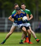 8 June 2019; David Devereaux of Wicklow in action against Evan Sweeney of Leitrim during the GAA Football All-Ireland Senior Championship Round 1 match between  Leitrim and Wicklow at Avantcard Páirc Seán Mac Diarmada in Carrick-on-Shannon, Leitrim. Photo by David Fitzgerald/Sportsfile