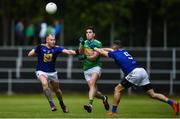 8 June 2019; Raymond Mulvey of Leitrim in action against Theo Smith, left, and David Devereaux of Wicklow during the GAA Football All-Ireland Senior Championship Round 1 match between  Leitrim and Wicklow at Avantcard Páirc Seán Mac Diarmada in Carrick-on-Shannon, Leitrim. Photo by David Fitzgerald/Sportsfile