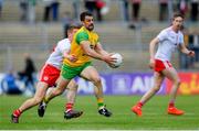 8 June 2019; Paddy McGrath of Donegal is tackled by Peter Harte of Tyrone during the Ulster GAA Football Senior Championship semi-final match between Donegal and Tyrone at Kingspan Breffni Park in Cavan. Photo by Ramsey Cardy/Sportsfile