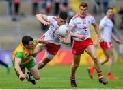 8 June 2019; Paddy McGrath of Donegal in action against Richard Donnelly of Tyrone during the Ulster GAA Football Senior Championship semi-final match between Donegal and Tyrone at Kingspan Breffni Park in Cavan. Photo by Ramsey Cardy/Sportsfile