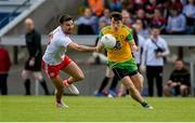 8 June 2019; Eoin McHugh of Donegal in action against Tiernan McCann of Tyrone during the Ulster GAA Football Senior Championship semi-final match between Donegal and Tyrone at Kingspan Breffni Park in Cavan. Photo by Daire Brennan/Sportsfile
