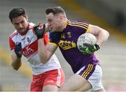 8 June 2019; David Shannon of Wexford in action against Christopher McKaigue of Derry during the GAA Football All-Ireland Senior Championship Round 1 match between Wexford and Derry at Innovate Wexford Park in Wexford. Photo by Matt Browne/Sportsfile