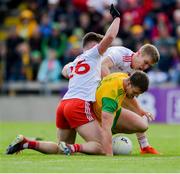 8 June 2019; Leo McLoone of Donegal in action against Liam Rafferty, left, and Pádraig Hampsey of Tyrone during the Ulster GAA Football Senior Championship semi-final match between Donegal and Tyrone at Kingspan Breffni Park in Cavan. Photo by Daire Brennan/Sportsfile