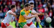 8 June 2019; Leo McLoone of Donegal in action against Liam Rafferty, left, and Pádraig Hampsey of Tyrone during the Ulster GAA Football Senior Championship semi-final match between Donegal and Tyrone at Kingspan Breffni Park in Cavan. Photo by Daire Brennan/Sportsfile