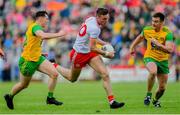 8 June 2019; Brian Kennedy of Tyrone in action against Jamie Brennan, left, and Leo McLoone of Donegal during the Ulster GAA Football Senior Championship semi-final match between Donegal and Tyrone at Kingspan Breffni Park in Cavan. Photo by Ramsey Cardy/Sportsfile