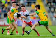 8 June 2019; Liam Rafferty of Tyrone in action against Ryan McHugh of Donegal during the Ulster GAA Football Senior Championship semi-final match between Donegal and Tyrone at Kingspan Breffni Park in Cavan. Photo by Ramsey Cardy/Sportsfile