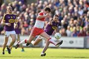 8 June 2019; Jason Rocks of Derry in action against Brian Malone of Wexford during the GAA Football All-Ireland Senior Championship Round 1 match between Wexford and Derry at Innovate Wexford Park in Wexford. Photo by Matt Browne/Sportsfile