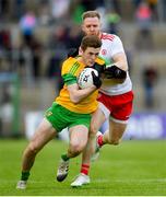 8 June 2019; Eoghan Bán Gallagher of Donegal is tackled by Frank Burns of Tyrone during the Ulster GAA Football Senior Championship semi-final match between Donegal and Tyrone at Kingspan Breffni Park in Cavan. Photo by Ramsey Cardy/Sportsfile