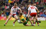 8 June 2019; Hugh McFadden of Donegal in action against Frank Burns, left, and Darren McCurry of Tyrone during the Ulster GAA Football Senior Championship semi-final match between Donegal and Tyrone at Kingspan Breffni Park in Cavan. Photo by Daire Brennan/Sportsfile