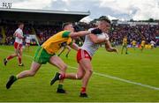 8 June 2019; Tiernan McCann of Tyrone in action against Ciaran Thompson of Donegal during the Ulster GAA Football Senior Championship semi-final match between Donegal and Tyrone at Kingspan Breffni Park in Cavan. Photo by Daire Brennan/Sportsfile