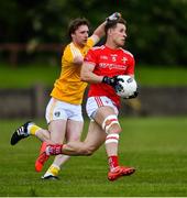 8 June 2019; Anthony Williams of Louth in action against Stephen Beatty of Antrim during the GAA Football All-Ireland Senior Championship Round 1 match between Louth and Antrim at Gaelic Grounds in Drogheda, Louth. Photo by Ray McManus/Sportsfile