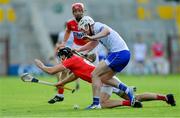 8 June 2019; Mark Ellis of Cork is tackled by Shane Bennett of Waterford during the Munster GAA Hurling Senior Championship Round 4 match between Cork and Waterford at Páirc Uí Chaoimh in Cork. Photo by Piaras Ó Mídheach/Sportsfile