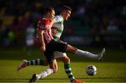 8 June 2019; Aaron Greene of Shamrock Rovers in action against Josh Kerr of Derry City during the SSE Airtricity League Premier Division match between Shamrock Rovers and Derry City at Tallaght Stadium in Dublin. Photo by Stephen McCarthy/Sportsfile