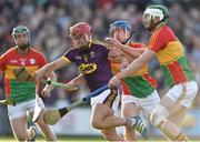 8 June 2019; Paul Morris of Wexford in action against Paul Doyle and Michael Doyle of Carlow during the Leinster GAA Hurling Senior Championship Round 4 match between Wexford and Carlow at Innovate Wexford Park in Wexford. Photo by Matt Browne/Sportsfile