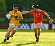 8 June 2019; Patrick McBride of Antrim in action against Rohan Holcroft of Louth during the GAA Football All-Ireland Senior Championship Round 1 match between Louth and Antrim at Gaelic Grounds in Drogheda, Louth. Photo by Ray McManus/Sportsfile