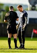 8 June 2019; Referee Martin McNally speaks to Louth goalkeeper Fergal Sheeky before issuing him a red card during the GAA Football All-Ireland Senior Championship Round 1 match between Louth and Antrim at Gaelic Grounds in Drogheda, Louth. Photo by Ray McManus/Sportsfile