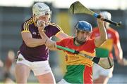 8 June 2019; Sean Whelan of Carlow in action against Rory O'Connor of Wexford during the Leinster GAA Hurling Senior Championship Round 4 match between Wexford and Carlow at Innovate Wexford Park in Wexford. Photo by Matt Browne/Sportsfile