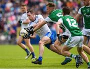 9 June 2019; Conor Boyle of Monaghan in action against Ulthem Kelm of Fermanagh during the GAA Football All-Ireland Senior Championship Round 1 match between Monaghan and Fermanagh at St Tiarnach's Park in Clones, Monaghan. Photo by Oliver McVeigh/Sportsfile