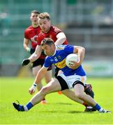 9 June 2019; Liam McGrath of Tipperary in action against Brendan McArdle of Down during the GAA Football All-Ireland Senior Championship Round 1 match between Down and Tipperary at Pairc Esler in Newry, Down. Photo by David Fitzgerald/Sportsfile