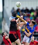 9 June 2019; Steven O'Brien of Tipperary in action against Down players, from left, Kevin McKernan, Rory Burns and Gerard Collins during the GAA Football All-Ireland Senior Championship Round 1 match between Down and Tipperary at Pairc Esler in Newry, Down. Photo by David Fitzgerald/Sportsfile