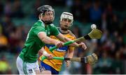 9 June 2019; Aidan O'Connor of Limerick in action against Oisin Clune of Clare during the Electric Ireland Munster Minor Hurling Championship match between Limerick and Clare at the LIT Gaelic Grounds in Limerick. Photo by Diarmuid Greene/Sportsfile