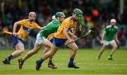 9 June 2019; Conner Hegarty of Clare in action against Patrick Kirby of Limerick during the Electric Ireland Munster Minor Hurling Championship match between Limerick and Clare at the LIT Gaelic Grounds in Limerick. Photo by Diarmuid Greene/Sportsfile