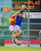 9 June 2019; John Keegan of Longford in action against Daniel St Ledger of Carlow during the GAA Football All-Ireland Senior Championship Round 1 match between Carlow and Longford at Netwatch Cullen Park in Carlow. Photo by Ramsey Cardy/Sportsfile