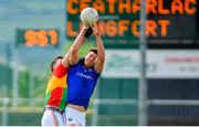 9 June 2019; John Keegan of Longford in action against Daniel St Ledger of Carlow during the GAA Football All-Ireland Senior Championship Round 1 match between Carlow and Longford at Netwatch Cullen Park in Carlow. Photo by Ramsey Cardy/Sportsfile