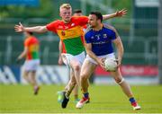 9 June 2019; Donal McElligott of Longford in action against Conor Doyle of Carlow during the GAA Football All-Ireland Senior Championship Round 1 match between Carlow and Longford at Netwatch Cullen Park in Carlow. Photo by Ramsey Cardy/Sportsfile