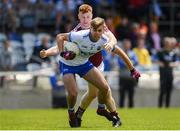 9 June 2019; Brian Looby of Waterford in action against Ronan Wallace of Westmeath during the GAA Football All-Ireland Senior Championship Round 1 match between Westmeath and Waterford at TEG Cusack Park in Mullingar, Westmeath. Photo by Harry Murphy/Sportsfile