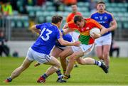 9 June 2019; Sean Gannon of Carlow in action against Daniel Mimnagh of Longford during the GAA Football All-Ireland Senior Championship Round 1 match between Carlow and Longford at Netwatch Cullen Park in Carlow. Photo by Ramsey Cardy/Sportsfile
