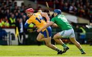 9 June 2019; John Conlon of Clare in action against Mike Casey of Limerick during the Munster GAA Hurling Senior Championship Round 4 match between Limerick and Clare at the LIT Gaelic Grounds in Limerick. Photo by Diarmuid Greene/Sportsfile