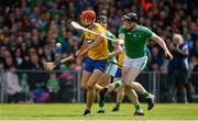9 June 2019; Peter Duggan of Clare in action against Declan Hannon of Limerick during the Munster GAA Hurling Senior Championship Round 4 match between Limerick and Clare at the LIT Gaelic Grounds in Limerick. Photo by Diarmuid Greene/Sportsfile