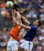 9 June 2019; Andy Murnin of Armagh in action against Padraig Faulkner of Cavan during the Ulster GAA Football Senior Championship Semi-Final Replay match between Cavan and Armagh at St Tiarnach's Park in Clones, Monaghan. Photo by Oliver McVeigh/Sportsfile