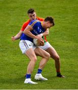 9 June 2019; John Keegan of Longford in action against Jordan Morrissey of Carlow during the GAA Football All-Ireland Senior Championship Round 1 match between Carlow and Longford at Netwatch Cullen Park in Carlow. Photo by Ramsey Cardy/Sportsfile