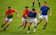 9 June 2019; John Keegan of Longford is tackled by Eoghan Ruth of Carlow during the GAA Football All-Ireland Senior Championship Round 1 match between Carlow and Longford at Netwatch Cullen Park in Carlow. Photo by Ramsey Cardy/Sportsfile