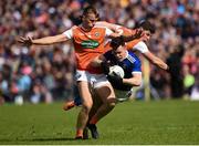 9 June 2019; Dara McVeety of Cavan in action against Rian O'Neill and Paddy Burns of Armagh during the Ulster GAA Football Senior Championship Semi-Final Replay match between Cavan and Armagh at St Tiarnach's Park in Clones, Monaghan. Photo by Oliver McVeigh/Sportsfile