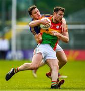 9 June 2019; Ciaran Moran of Carlow in action against Daniel Mimnagh of Longford during the GAA Football All-Ireland Senior Championship Round 1 match between Carlow and Longford at Netwatch Cullen Park in Carlow. Photo by Ramsey Cardy/Sportsfile