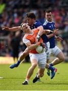 9 June 2019; Mark Shields of Armagh in action against Conor Moynagh of Cavan during the Ulster GAA Football Senior Championship Semi-Final Replay match between Cavan and Armagh at St Tiarnach's Park in Clones, Monaghan. Photo by Philip Fitzpatrick/Sportsfile