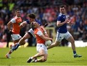 9 June 2019; Mark Shields of Armagh in action against Conor Moynagh of Cavan during the Ulster GAA Football Senior Championship Semi-Final Replay match between Cavan and Armagh at St Tiarnach's Park in Clones, Monaghan. Photo by Philip Fitzpatrick/Sportsfile