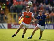 9 June 2019; Niall Grimley of Armagh in action against Oisin Pierson of Cavan during the Ulster GAA Football Senior Championship Semi-Final Replay match between Cavan and Armagh at St Tiarnach's Park in Clones, Monaghan. Photo by Philip Fitzpatrick/Sportsfile