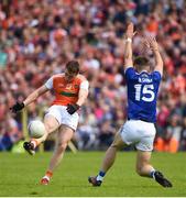 9 June 2019; Charlie Vernon of Armagh in action against Conor Madden of Cavanduring the Ulster GAA Football Senior Championship Semi-Final Replay match between Cavan and Armagh at St Tiarnach's Park in Clones, Monaghan. Photo by Oliver McVeigh/Sportsfile