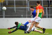 9 June 2019; Michael Quinn of Longford in action against Robert Sansom of Carlow during the GAA Football All-Ireland Senior Championship Round 1 match between Carlow and Longford at Netwatch Cullen Park in Carlow. Photo by Ramsey Cardy/Sportsfile