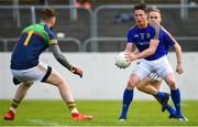 9 June 2019; Michael Quinn of Longford in action against Robert Sansom of Carlow during the GAA Football All-Ireland Senior Championship Round 1 match between Carlow and Longford at Netwatch Cullen Park in Carlow. Photo by Ramsey Cardy/Sportsfile