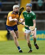 9 June 2019; Patrick Reale of Limerick in action against Colm O'Meara of Clare during the Electric Ireland Munster Minor Hurling Championship match between Limerick and Clare at the LIT Gaelic Grounds in Limerick. Photo by Diarmuid Greene/Sportsfile