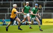 9 June 2019; Patrick Reale of Limerick in action against Colm O'Meara of Clare during the Electric Ireland Munster Minor Hurling Championship match between Limerick and Clare at the LIT Gaelic Grounds in Limerick. Photo by Diarmuid Greene/Sportsfile