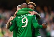 10 June 2019; David McGoldrick of Republic of Ireland celebrates with team-mate Callum Robinson after his shot was deflected in by Joseph Chipolina of Gibraltar to score his side's first goal during the UEFA EURO2020 Qualifier Group D match between Republic of Ireland and Gibraltar at the Aviva Stadium, Lansdowne Road in Dublin. Photo by Stephen McCarthy/Sportsfile