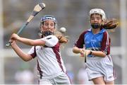 11 June 2019; Sadhbh Ní Chatháin of Gaelscoil na Camógie, Cluain Dolcáin, Dublin in action against Orla Dunne of Scoil Mhuire NS, Woodview, Dublin during the Allianz Cumann na mBunscol Finals 2019 Croke Park in Dublin. Photo by Eóin Noonan/Sportsfile