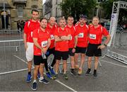 12 June 2019; Cumnor Construction Limited runners, from left, Michael O'Mahony, Eamonn O'Mahony, Mike Varian, Cian O'Mahony, Anthony Ahern, Kieran Crean and Damian O'Connor before the Grant Thornton Corporate 5K Team Challenge, Cork City, The South Mall in Cork City. Photo by Piaras Ó Mídheach/Sportsfile